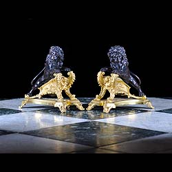A pair of Antique Louis XVI bronze Chenets