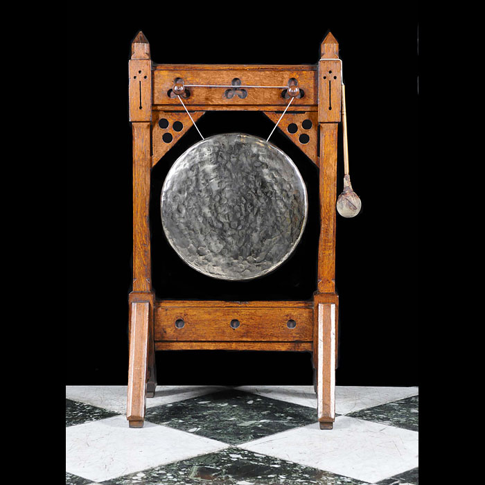 An Antique Arts & Crafts Oak Dinner Gong