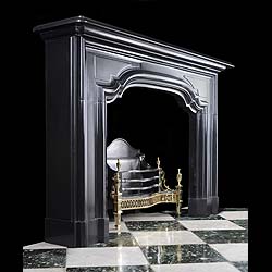 A large antique Belgian Black Marble Baroque Style Chimneypiece Mantel