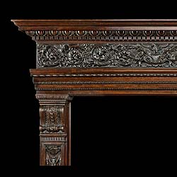 A large highly carved Italian Venetian style Antique walnut Fireplace Surround
