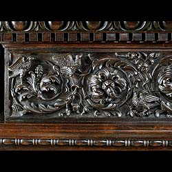 A large highly carved Italian Venetian style Antique walnut Fireplace Surround
