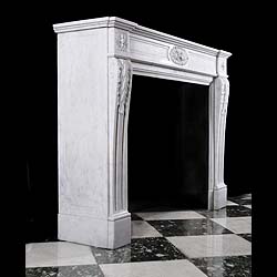 A small Carrara marble Louis XVI style antique chimneypiece