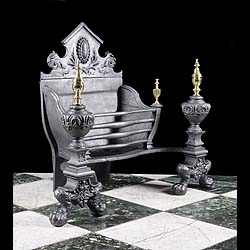 A Baroque Style Cast Iron Fire Basket 
