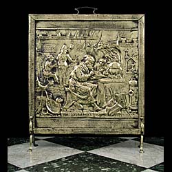 An Antique brass pictorial firescreen