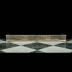 A Brass Neoclassical Style Fireplace Fender 