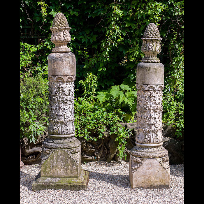  A pair of Pineapple topped antique terracotta pillars  