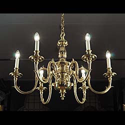 A pair of fine 20th century six branch brass chandeliers