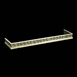 A Neo Classical style Antique brass Fireplace Fender