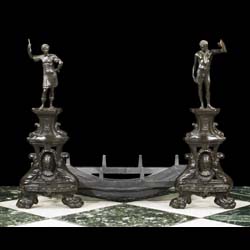 A pair of French Baroque Antique bronze figural andirons