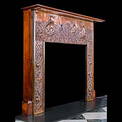 A repousse copper antique Fireplace Surround attributed to John Pearson