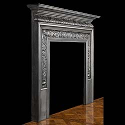 An attractive cast iron 1867 fireplace surround