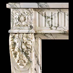 An Antique Louis XVI Pavonazzetto marble fireplace surround