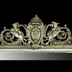 A Tall Silvered Louis XVI Wall Mirror