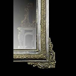A Tall Silvered Louis XVI Wall Mirror