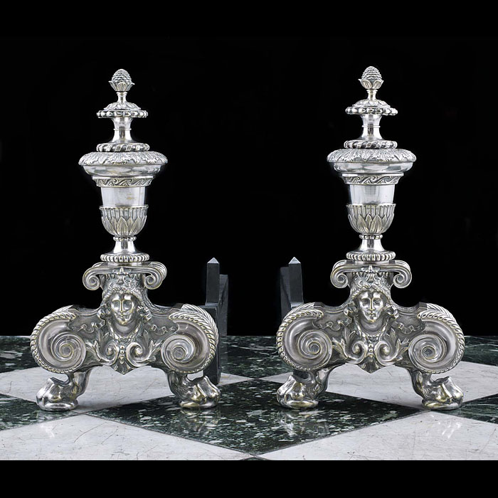 A pair of silvered Antique Baroque style andirons 


