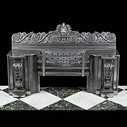 A substantial antique cast iron Hob Grate in the Regency manner. 
