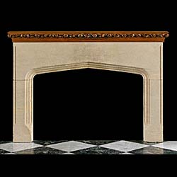 A Tudor Gothic style antique carved stone antique chimneypiece 