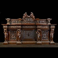 A very imposing Venetian Baroque style Antique walnut Chimneypiece 