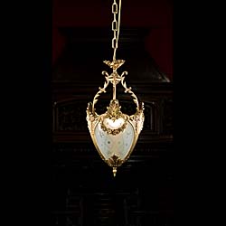 An Ornate Regency Style Brass Ceiling Light