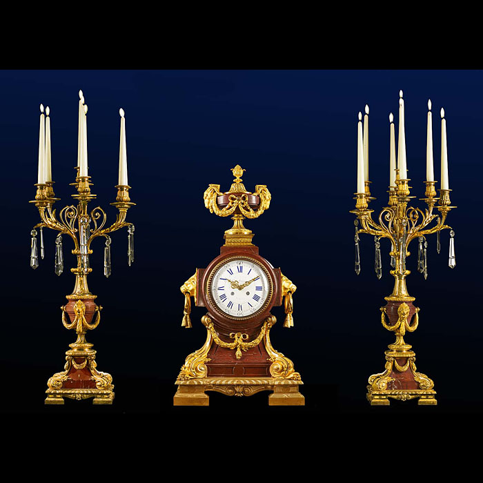 A very fine ormolu and Rosso Alicante antique marble clock garniture