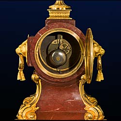 A very fine ormolu and Rosso Alicante antique marble clock garniture