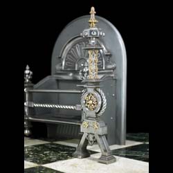 A Baroque style steel and brass antique Victorian fire grate 