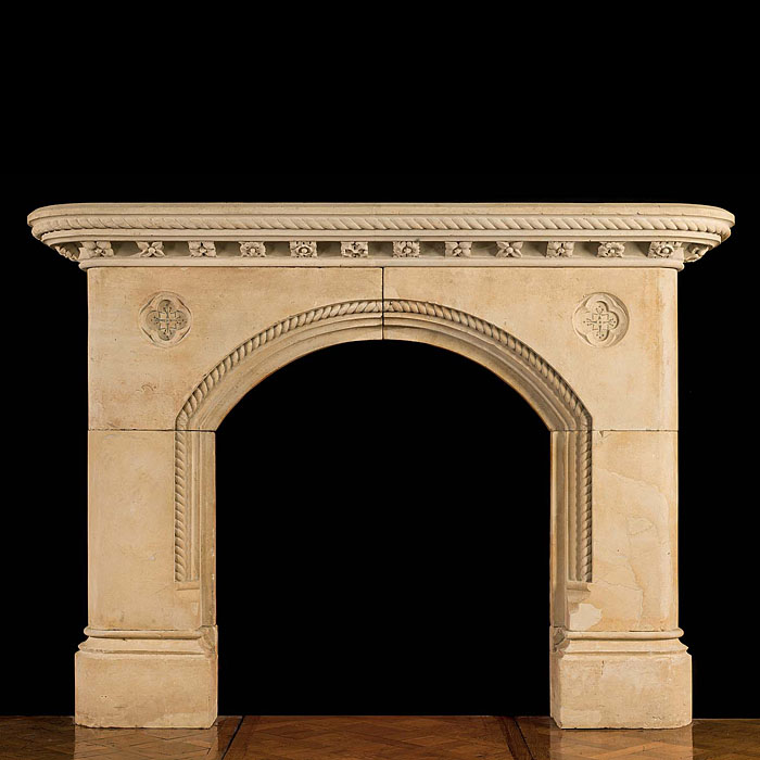 A Gothic Revival Antique chimneypiece in the manner of Pugin 