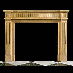 An antique Regence style marble fireplace surround