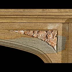 A Victorian Tudor style antique fossil stone chimneypiece     