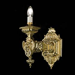  A pair of large Baroque style antique wall lights