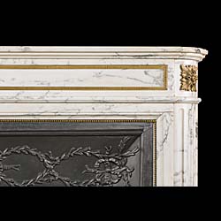 An antique ormolu mounted arabescato marble French Regency chimneypiece