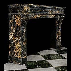 A French Louis XVI style antique Portoro marble fireplace surround  
