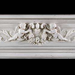 An English Louis XVI style chimneypiece in white statuary marble. 