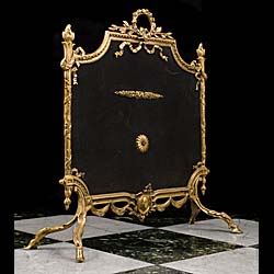 An Antique French Regency gilt brass firescreen 
