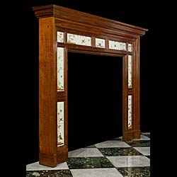 A Victorian antique chimneypiece in walnut set with rare Minton Tiles
