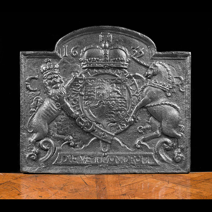 An English fire back in cast iron, with Royal coat of arms.