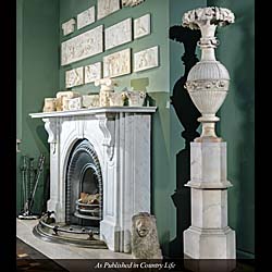 A Victorian Statuary Marble Arched Fireplace