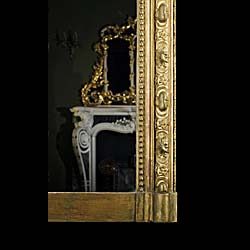 A French gilt and gesso antique overmantel mirror   