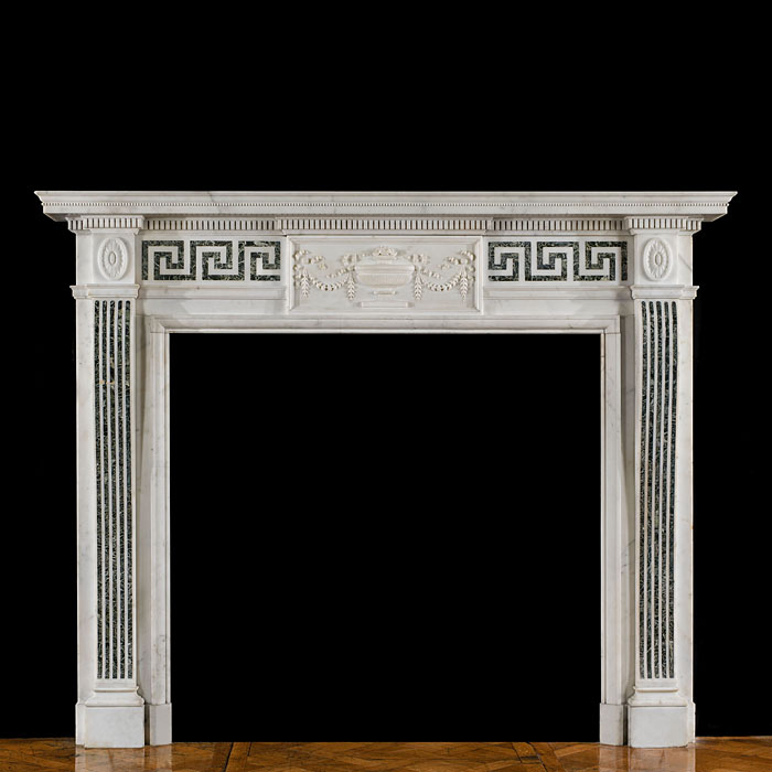 A Neoclassical Style Statuary Fireplace