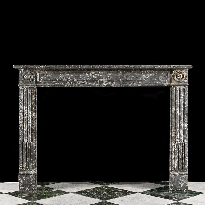 An Antique Louis XVI style fireplace surround in St Anne's Marble   
