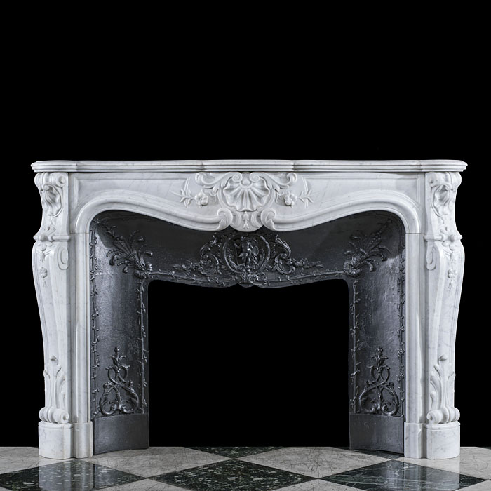 A Carrara Marble Louis XV chimneypiece