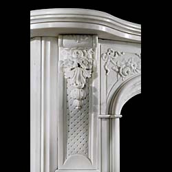 An antique Statuary Marble Rococo style fireplace surround