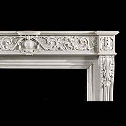 A large French Louis XVI style Carrara Marble antique fireplace 