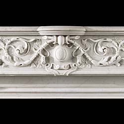 A large French Louis XVI style Carrara Marble antique fireplace 