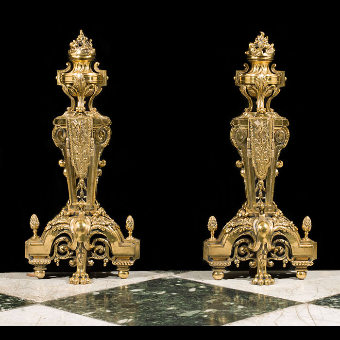  A pair of large brass Louis XVIstyle antique chenets.  