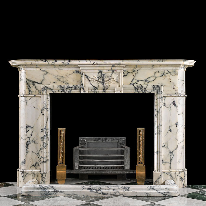 An antique Belgian Louis XVI style Pavonazza marble fireplace.