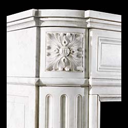 A Louis XVI Style Carrara Marble Fireplace