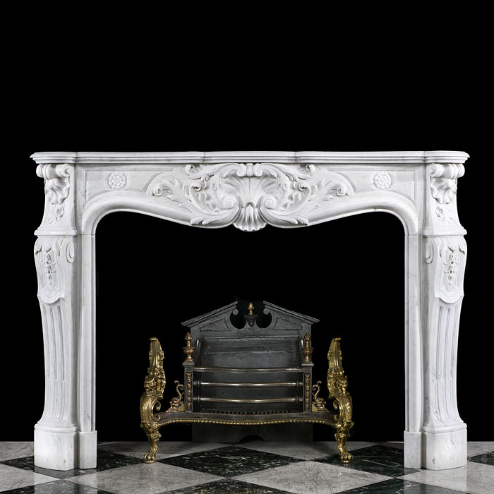 A Rococo style Carrara Marble fire surround