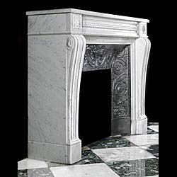 A French Louis XVI style antique marble fireplace and insert.
