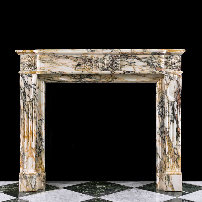A Louis XVI Pavonazza Marble Fireplace